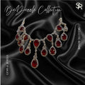 Zeline Ruby and American Diamond Necklace and Matching Drop Earrings Set